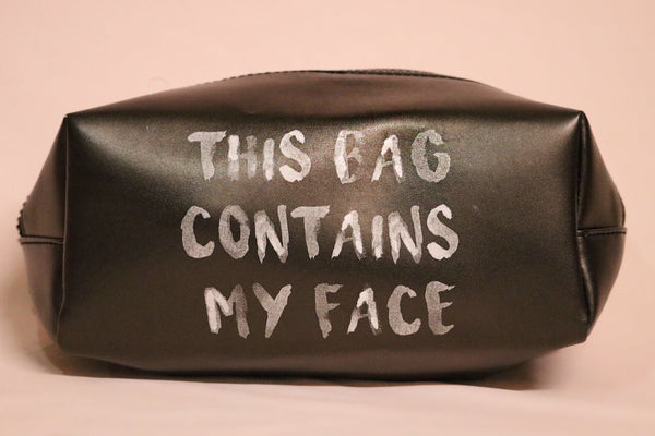 "This Bag Contains My Face" Makeup Bag In Black